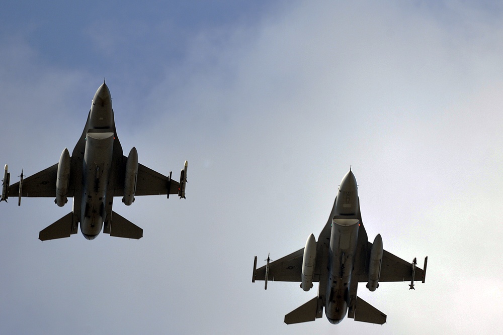 Two Homestead-based F-16C aircraft flying over RAF Lakenheath